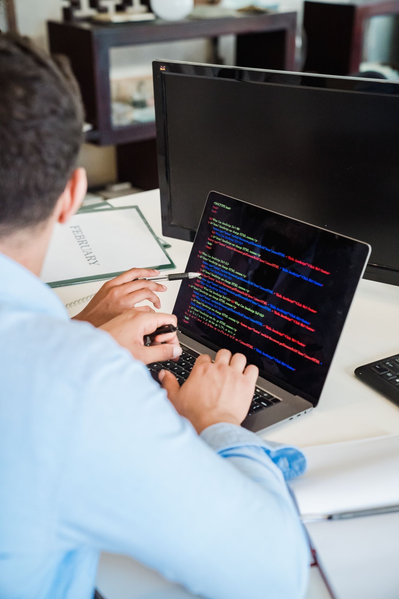Developer at work on a laptop